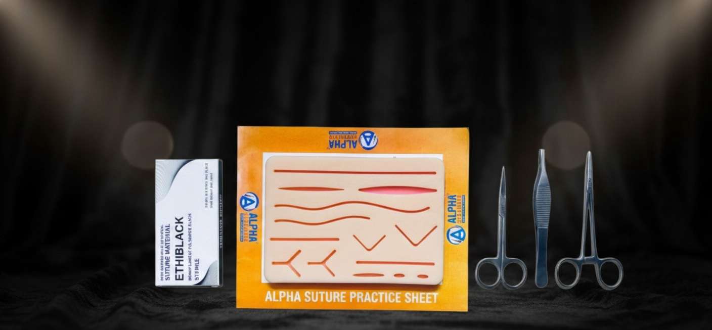 Alpha Surgicals Suture Practice Kit with silicone suture pad, needle holder, scissors, and forceps for medical student suturing practice.