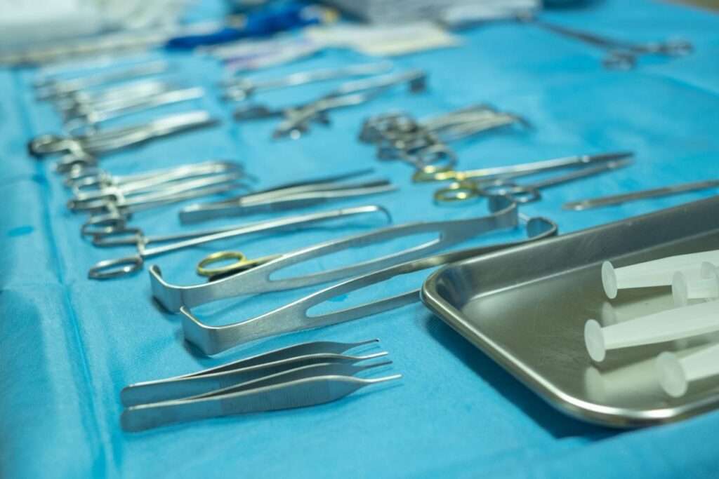 "Surgeon using precision surgical instruments to improve procedural accuracy"